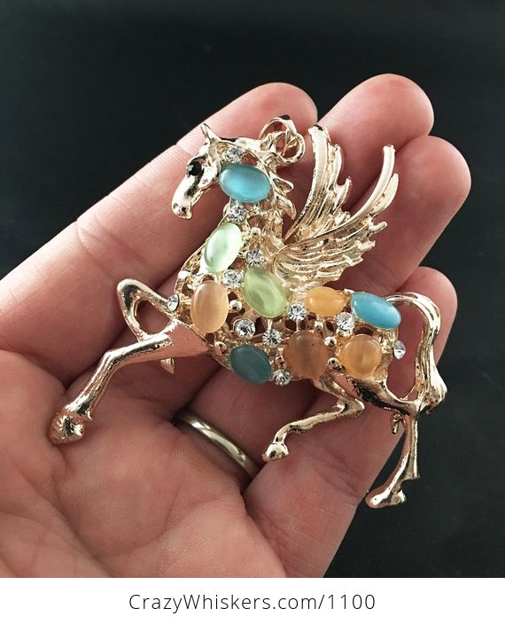 Beautiful Pegasus Winged Horse Pendant with Crystal Rhinestones and Synthetic Colorful Cats Eye Stones on Gold Tone - #QYXYMRes0j0-1