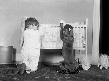 Digital Photo of a Little Boy Child and His Dog Kneeling by a Crib #nDPKwXNJjwU