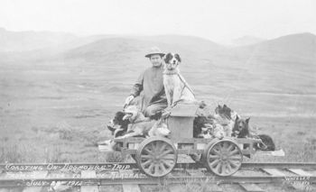 Vintage Digital Photo of a Man with His Dogs on a Rail Cart Trip from Shelton to Nome July 28th 1912 #aaNWUiW2ODY