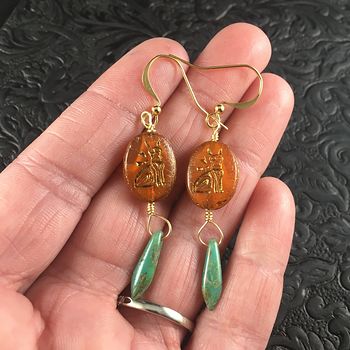 Gold and Orange Glass Kitty Cat and Dagger Earrings #p6abXrEYGTI